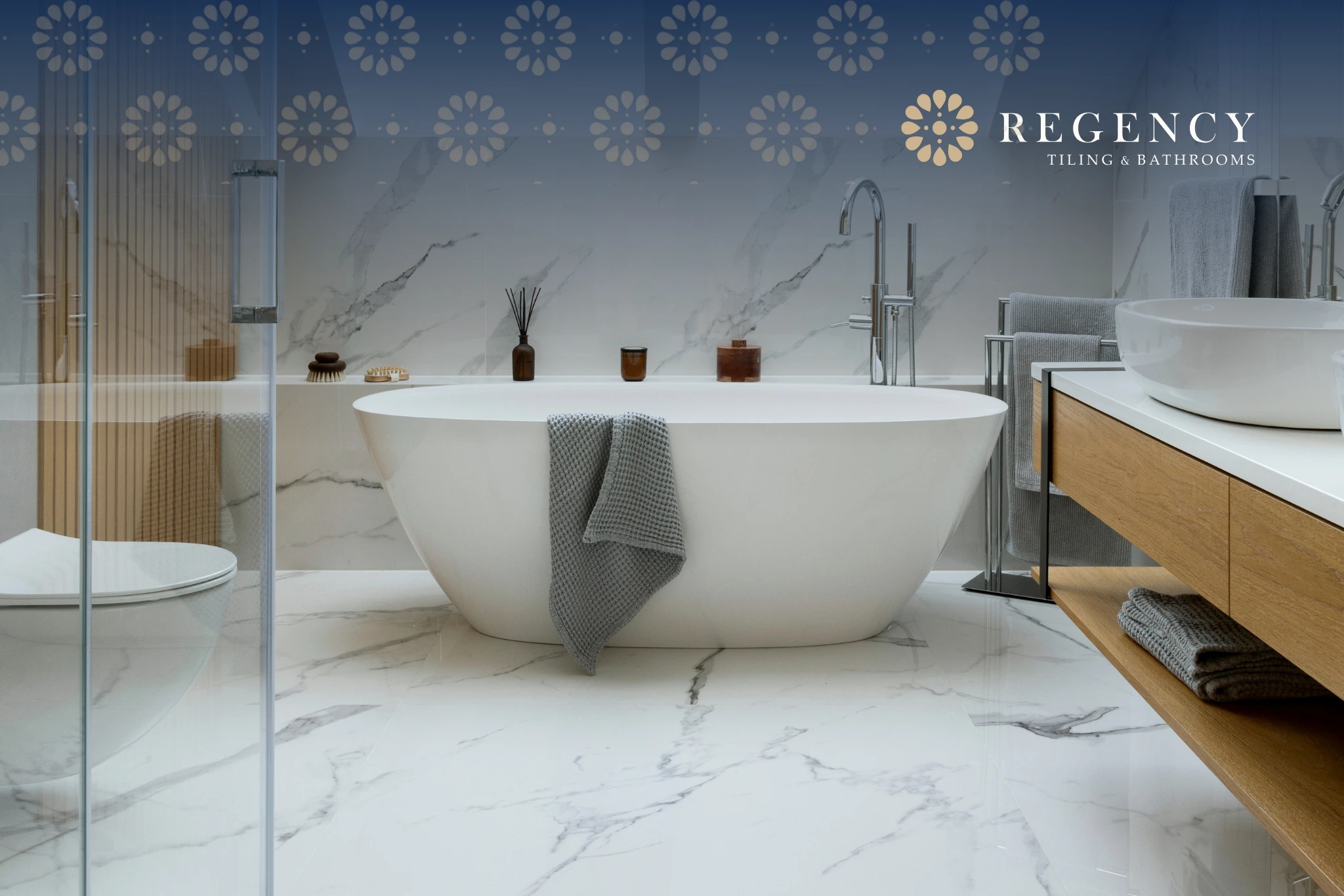Modern freestanding bath set in a marble-tiled bathroom, embodying Regency’s ethos of elegance and enduring craftsmanship.